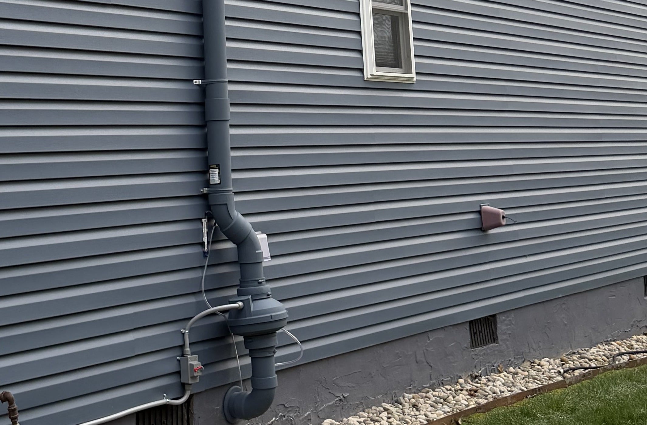 Radon mitigation system installed on an East Tennessee home ahead of a home sale